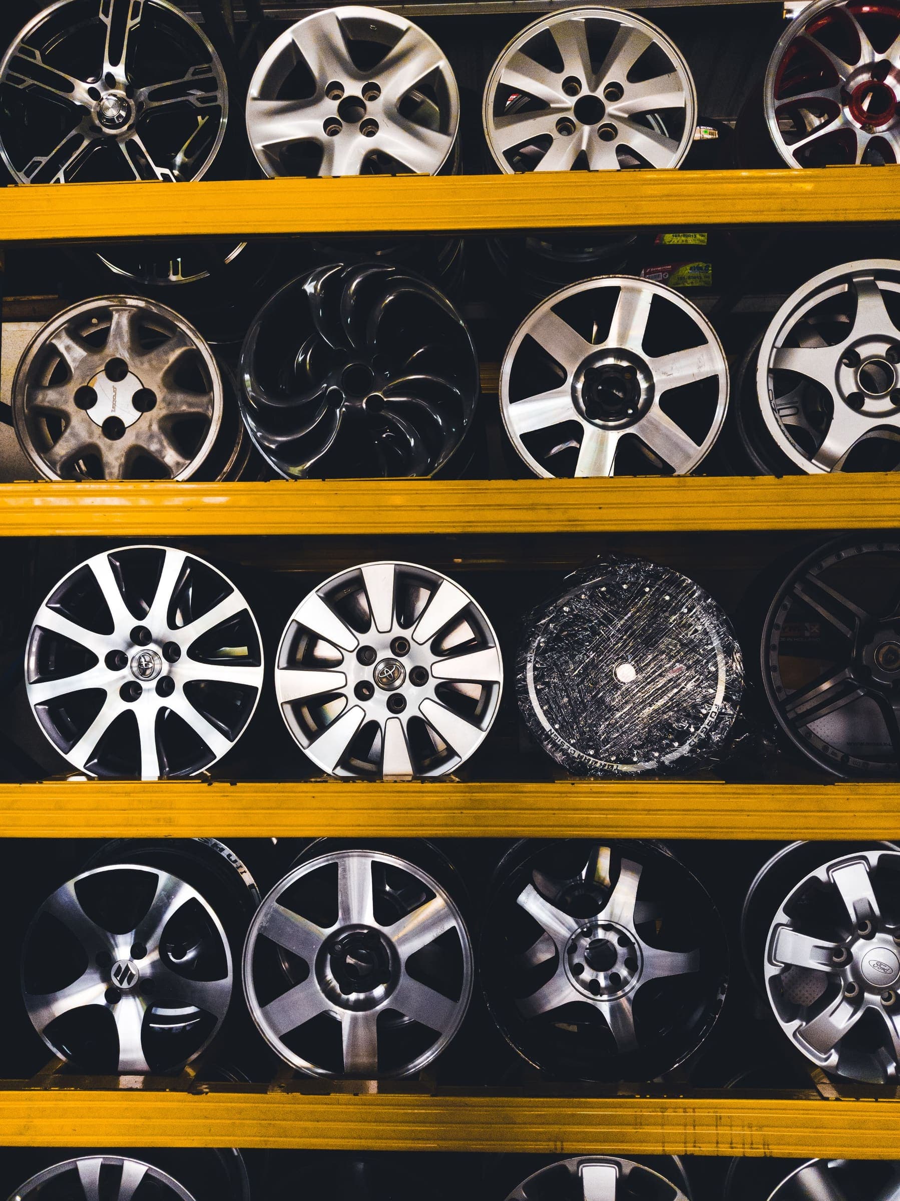 Alloy wheels stacked on shelves Alloy wheels stacked on shelves
